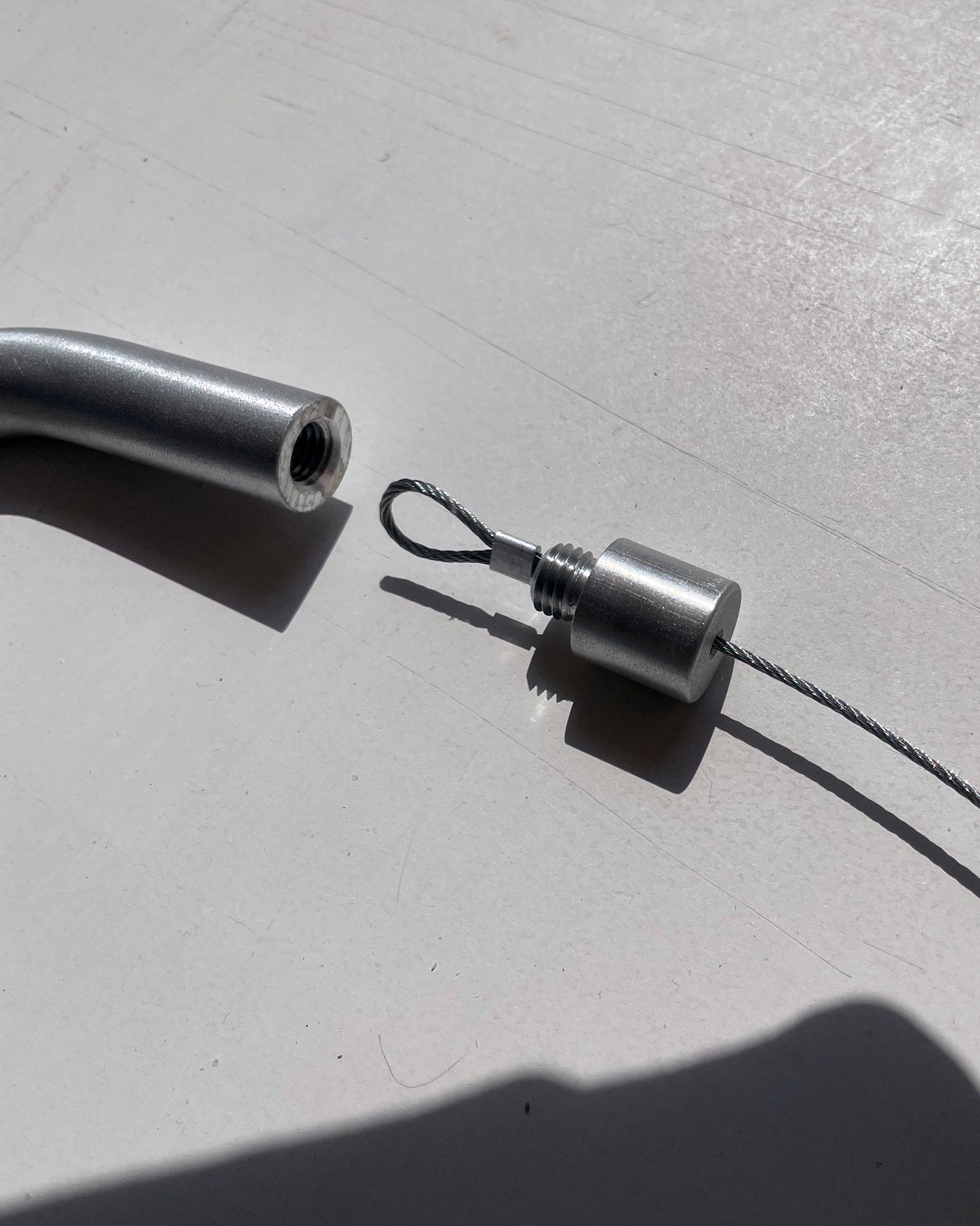 Sine Hanging Rack Raw Aluminum